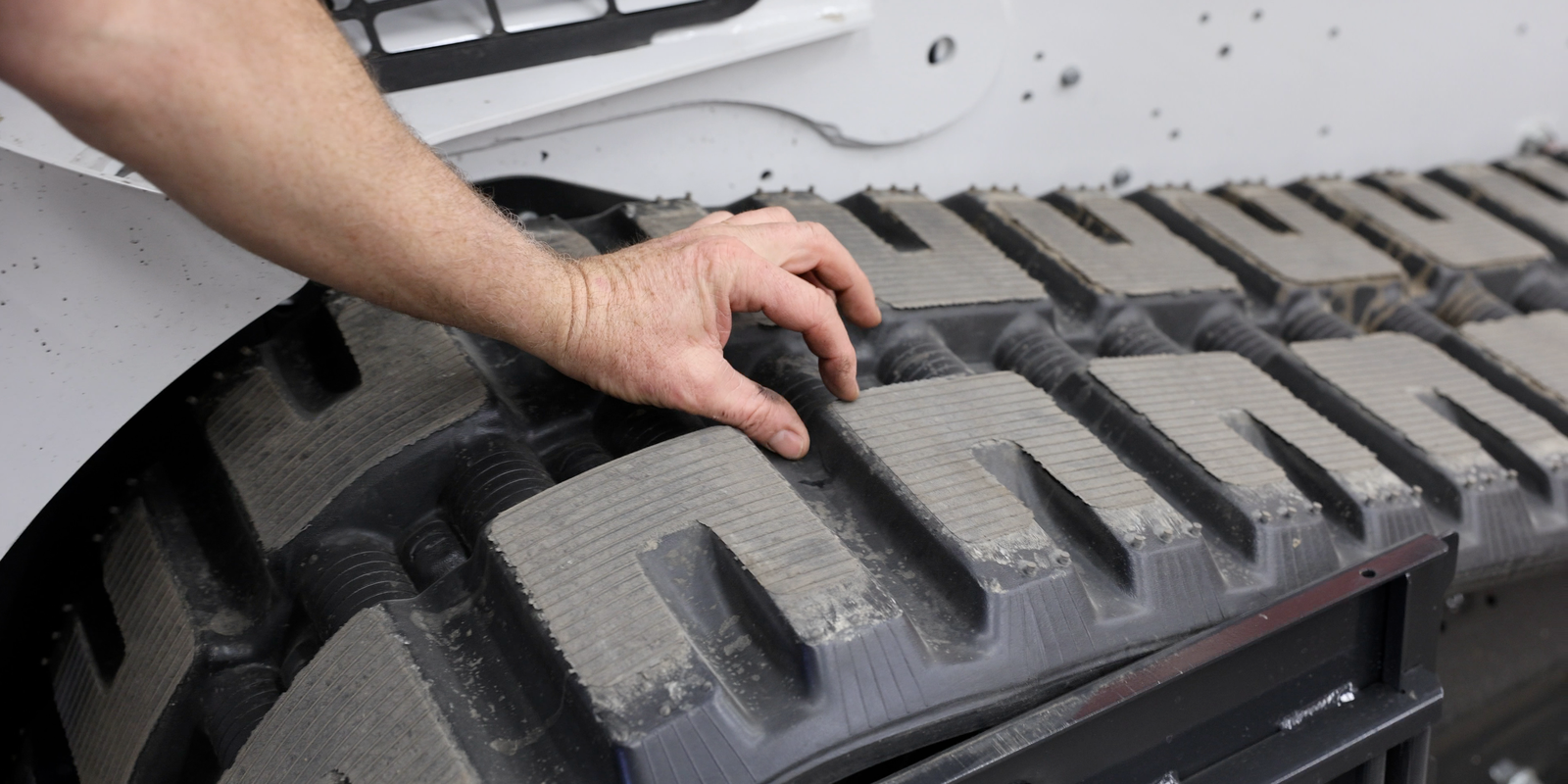 4. Inspect Tracks or Tires for Wear 